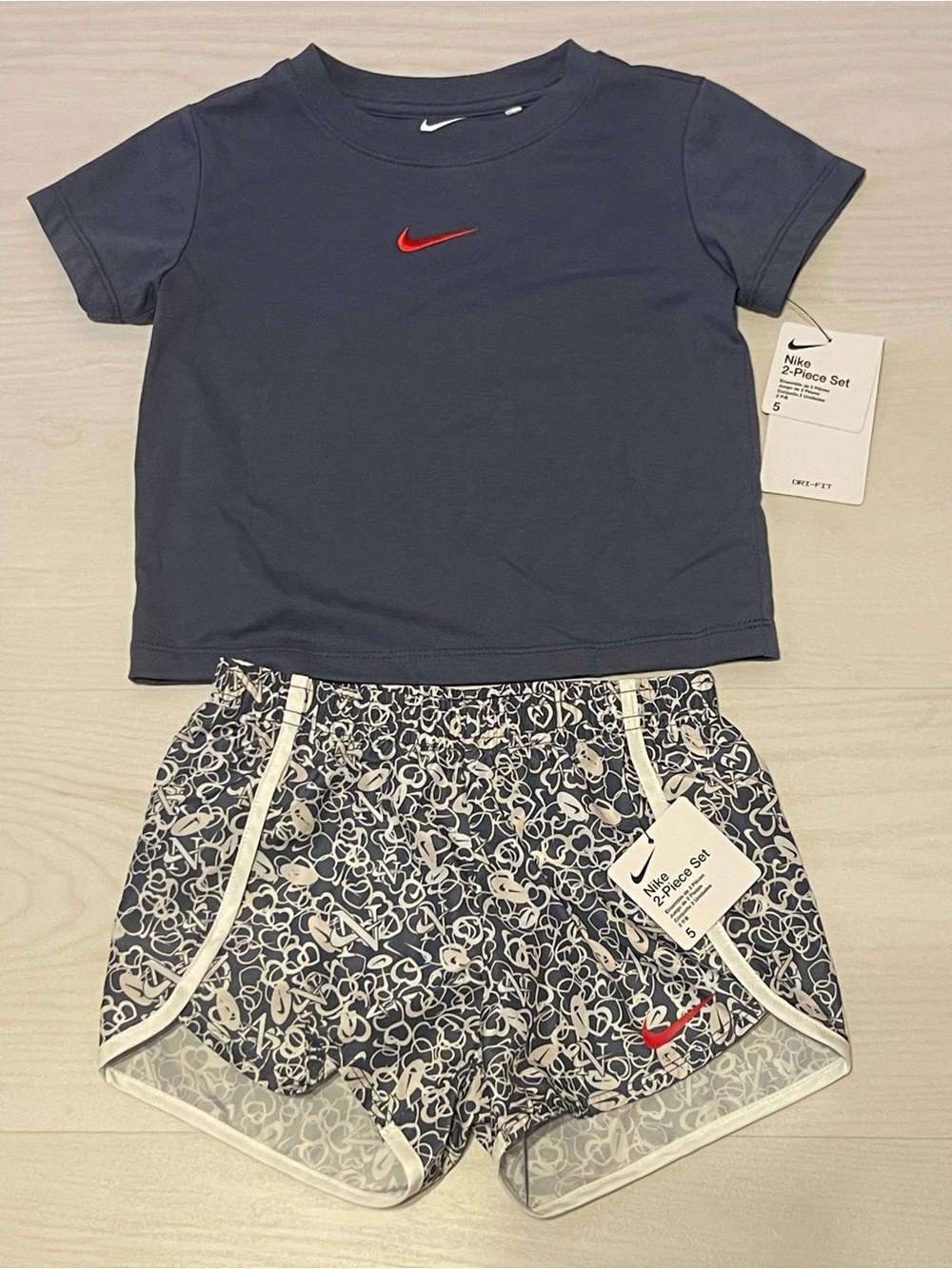 Nike Kids 2-Piece Navy Top and Printed Shorts Set with Red Swoosh